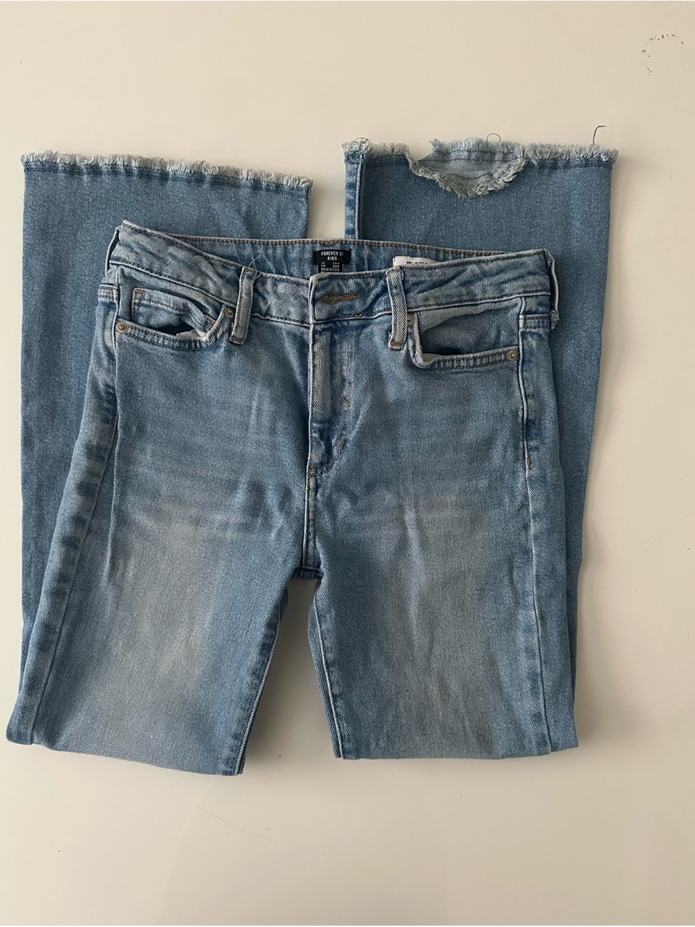 Girl’s Light Blue Raw Hem Jeans